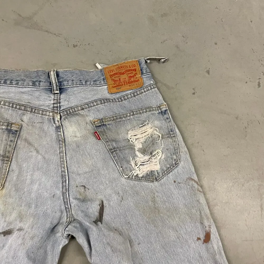 y2k thrashed baggy Levi’s 550 jeans 34x32